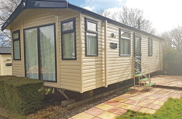 Modern caravan with one double and one twin.