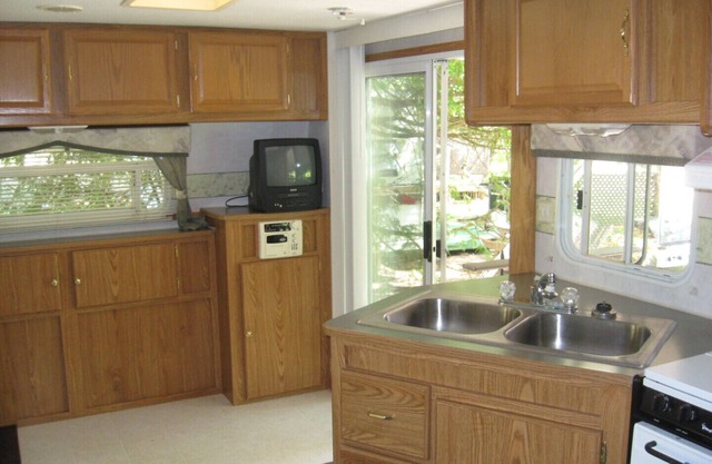 Modern, clean trailer, waterview at small campground (The Terry)
