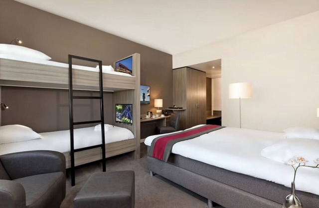 Modern Comfort Steps from Rotterdam Airport with Onsite Dining!