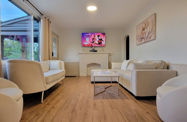 Modern Cozy Retreat: 2 King, 1 Queen, PS5, & Sunroom