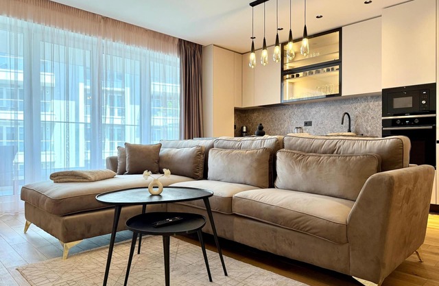 Modern furnished vacation apartment with covered balcony directly on Lebada Lake