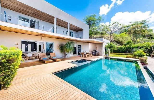 Modern Hilltop Villa with Relaxing Pool Deck, Infinity Pool & Patio with Spectac