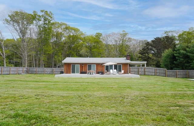 Modern home with large deck, firepit, enclosed yard, & immaculate kitchen