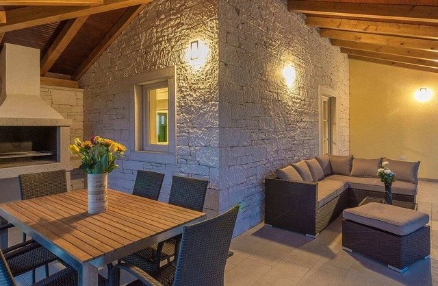 Modern house with pool and beautiful landscaped environment in a quiet location