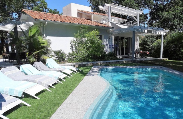 Modern house with swimming pool close to the beach