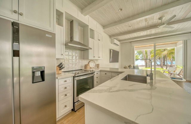 Modern Luxury Meets Caribbean Charm 3-Bed, 3-Bath Beachfront Townhome