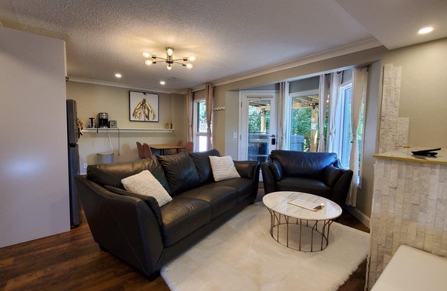 Modern renovated walkout bsmt with new Hot tub