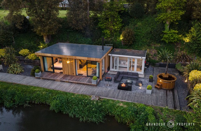 Modern Riverside Lodge with Hot Tub in Sopley, New Forest.