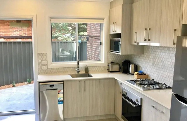 Modern townhouse with private courtyard located in the CBD.