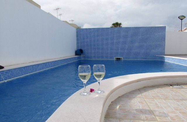 Modern villa with private pool and aircon, walk to beach and town.