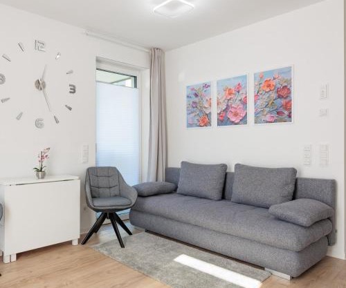 Modernes Apartment mit Terrasse & Garten, Parkplatz & Self-Check-in