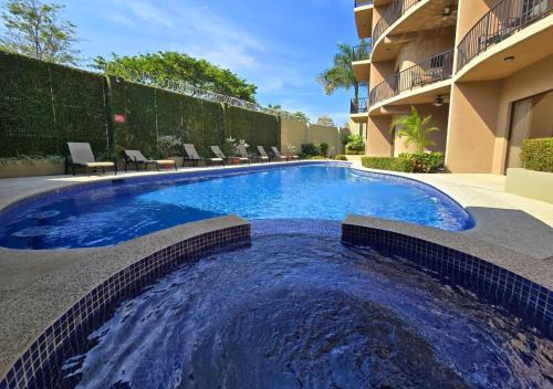 Monaco Condominiums Unit 3, Luxury 3BR Poolside Escape, Walk to Beach