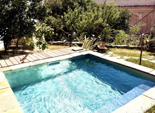 MONTERA Appartement Centre-ville avec piscine chauffée et jardin
