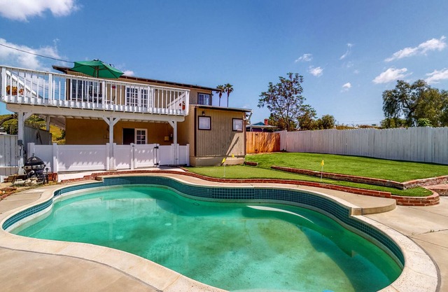 Mountain view home with pool, putting green, grill
