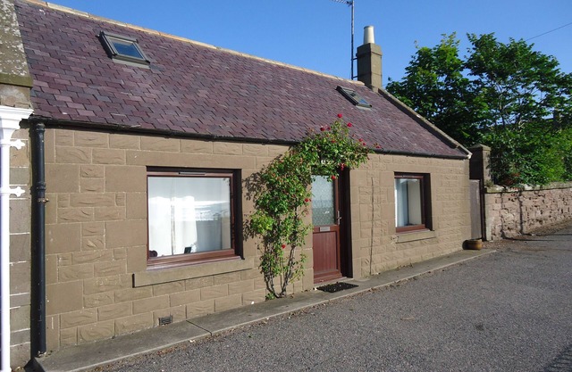 Myrtle Cottage set in an elevated location with spectacular sea views.