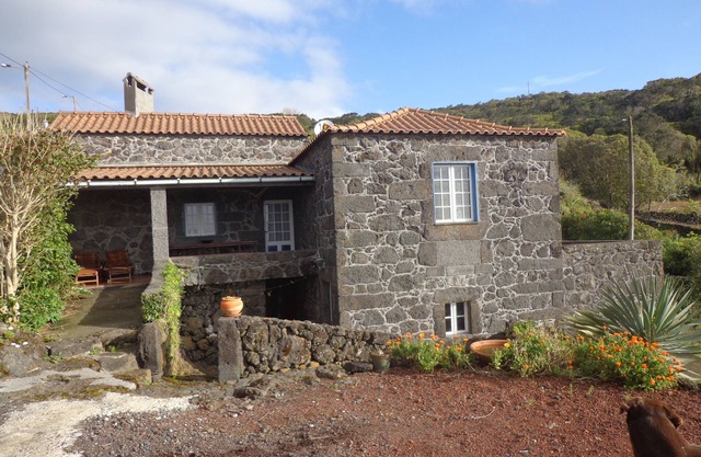 Natural stone holiday home with sea view