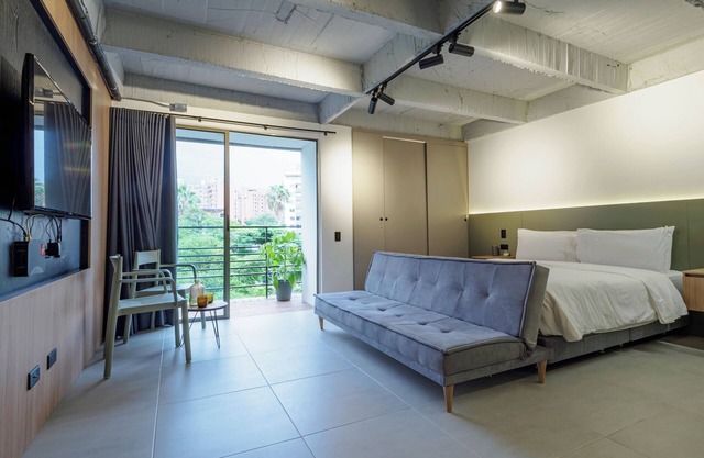 Nature Meets Comfort: Patio Bonito Studio with AC