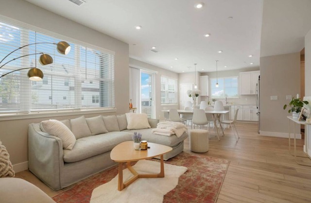 New 3-bedroom Townhome in Edgewater with Attached Garage and Fenced Yard