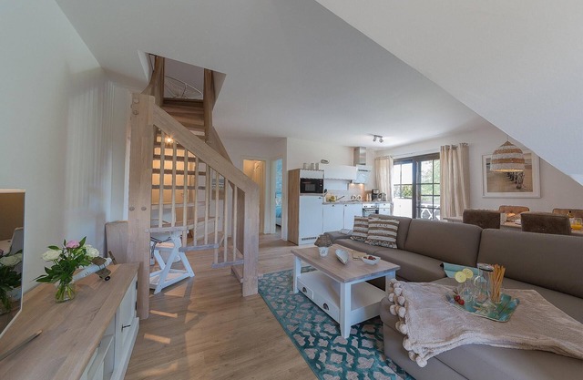 New, bright and friendly beach vacation apartment for up to 6 people with sauna house.