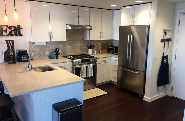 New Fully Furnished Upscale Condo With Beautiful City And Bay Views.
