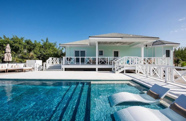 New Home w/Heated Pool on Prestigious Banks Rd