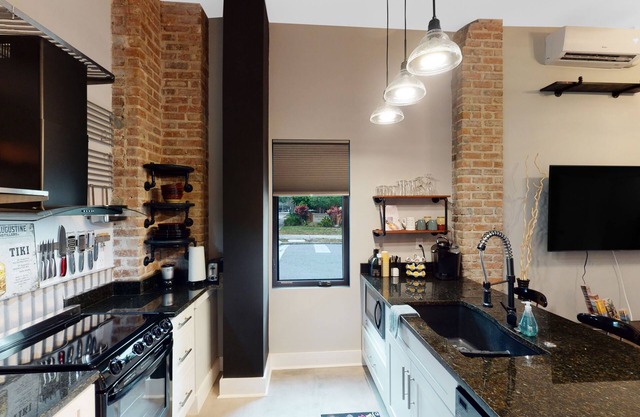 NEW industrial style micro-loft in a quiet neighborhood and walkable to FUN!