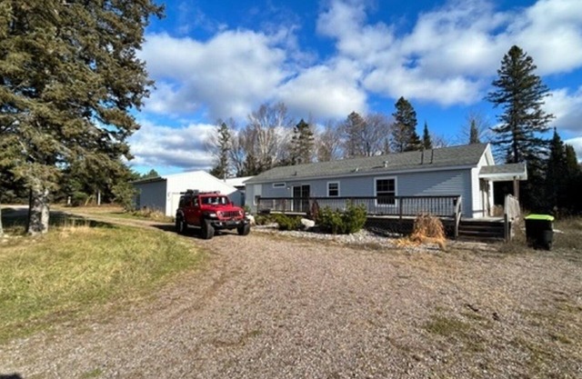 NEW LISTING - FARMHOUSE -VERY CLOSE TO SNOWMOBILE TRAILS - VERY PRIVATE