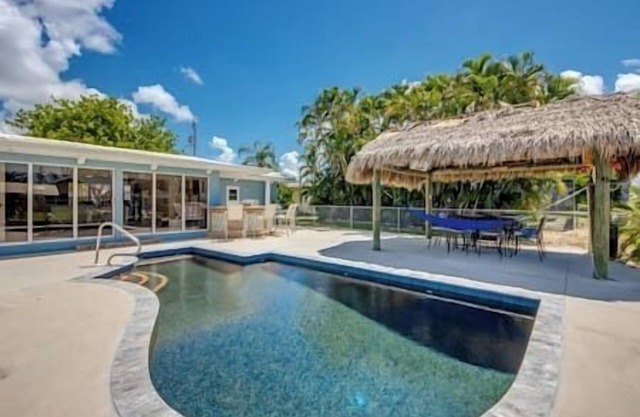 NEW LISTING! Heated Pool, Canal, Outdoor Bar, King Bed