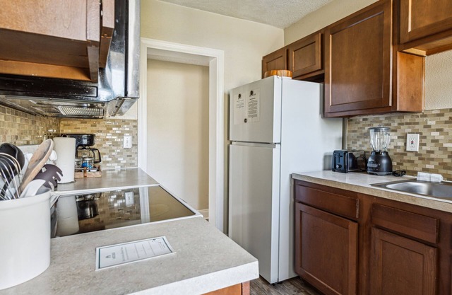 NEW LISTING! Lakeshore Lush (4-Bedroom Home) - Pets Allowed by RedAwning