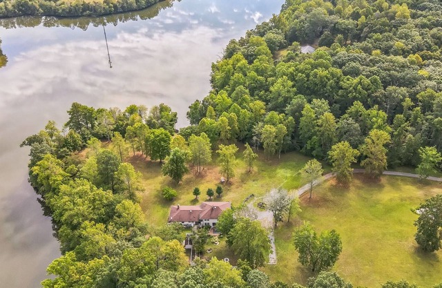 NEW LISTING! Tranquil Lakefront Villa Retreat on Lake Orange by RedAwning
