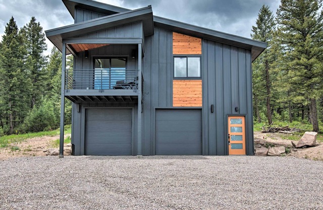 NEW! Modern evergreen cottage on 35 acres with views!
