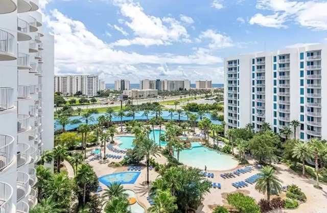 New Palms Listing! 2 King Masters~Lagoon Pool~Partial Gulf Views~Updated Unit!