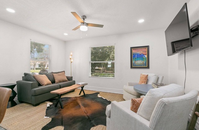 NEW! SoHo Sanctuary - Gorgeous Apartment Steps to S Howard Ave with Fenced Yard