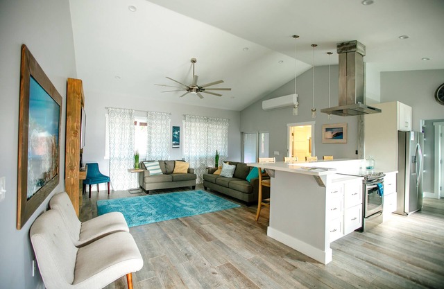 New Spacious 3 Bedroom Home With A/C, steps from Hukilau Beach, 30 Day