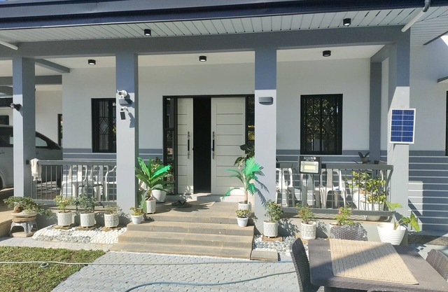 New white and gray BIG house located in a nice quiet community.