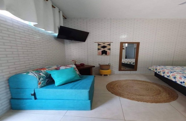 Next to lush nature, suite with TV, kitchen, wifi, barbecue, and garage