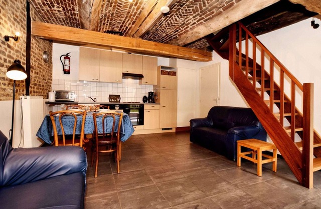 Nice apartments in a monumental square farm.