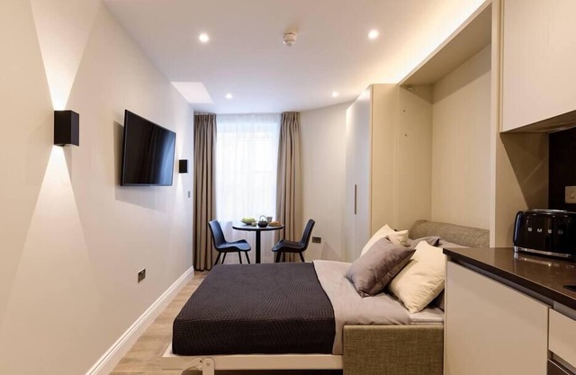 Nice micro studio with Shared bathroom.