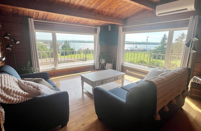 Ocean view cottage with a perfect wrap around deck to watch beautiful sunsets.