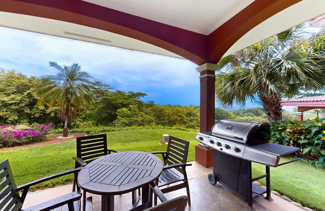 Ocean-view dog-friendly condo near the beach with pool, golf, patio, grill