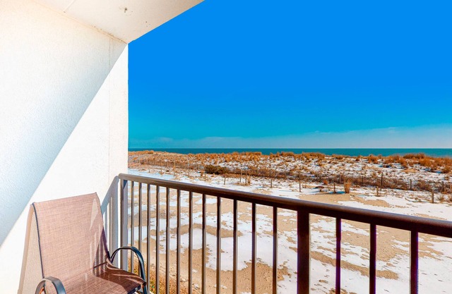 Oceanfront condo near golf with beach access, balcony, views, & washer/dryer