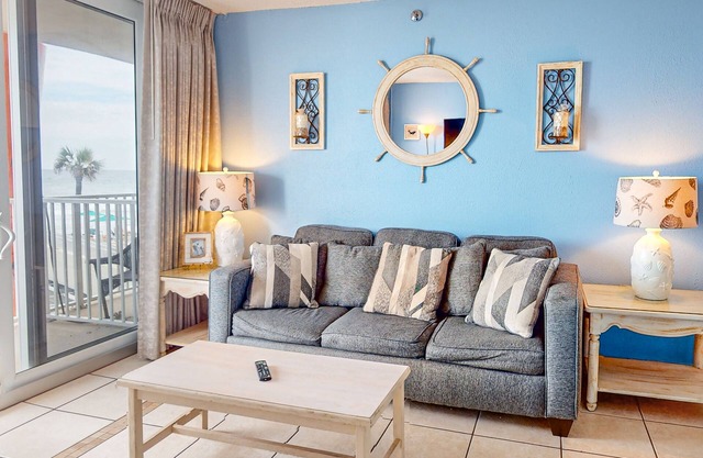 Oceanfront condo with pool, hot tub, balcony, game room, and fitness room