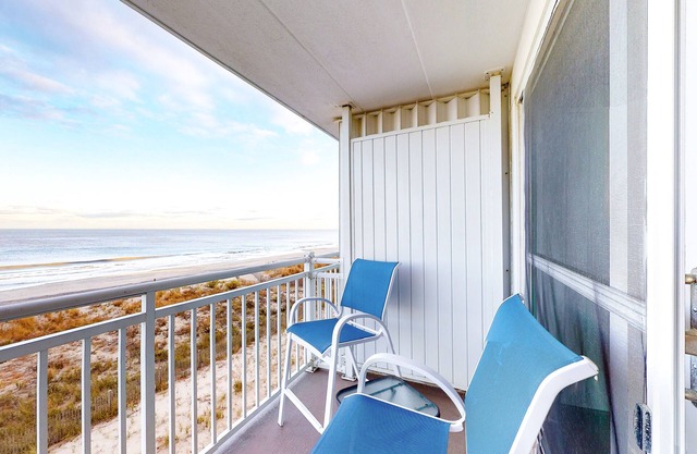 Oceanfront Condo with Private Balcony, Beach Access, WiFi & Washer/Dryer