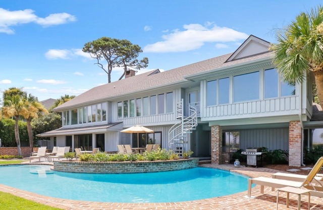 Oceanfront home with huge windows and a panoramic views