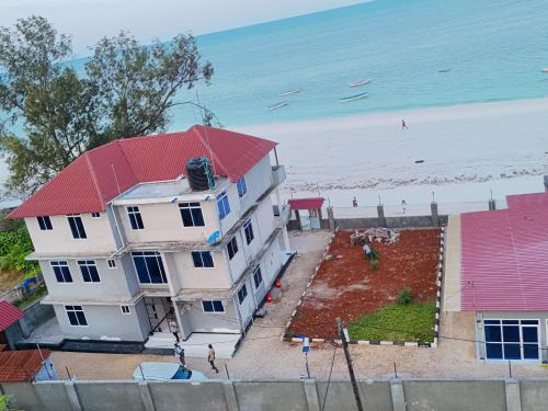 Oceanfront Oasis Zanzibar 2BR Beachfront Suites Ground Floor, Free WiFi