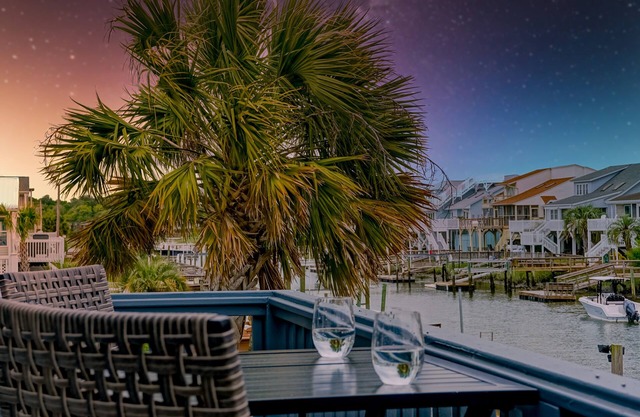 OIB Canal Home - GREAT outdoor - under house & screen porch, LARGE kitchen, DOCK