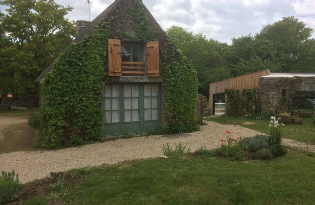 Old renovated stone house in the town of Ploemel