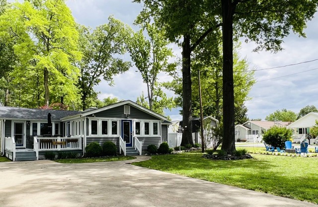 On The Point, Spacious Home ! You will Love the Sunroom, The Decor and Location!