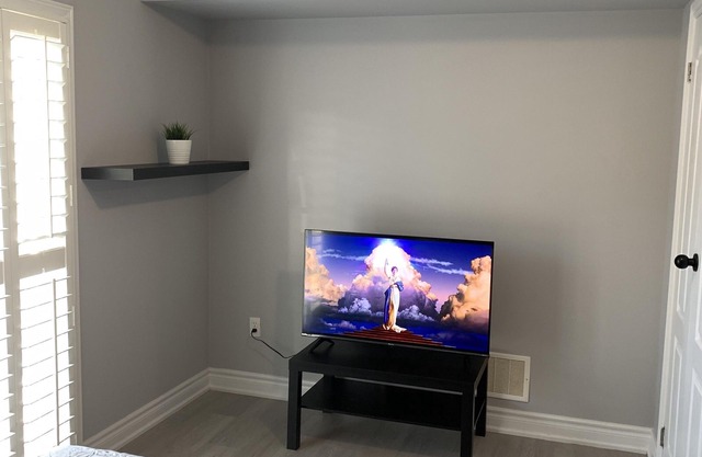One bedroom ensuite toilet on main level & kitchen, living, bathroom lower level