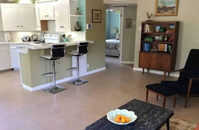 One of a kind secluded and stylish MCM desert bungalow on three lots, high up in the La Quinta Cove.